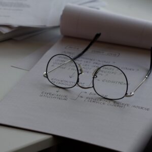 reading glasses on notepad