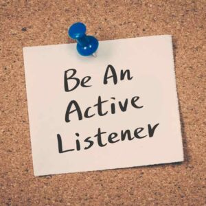 Leaders Listen Postit saying be an active listening. Active listening is important for effective management